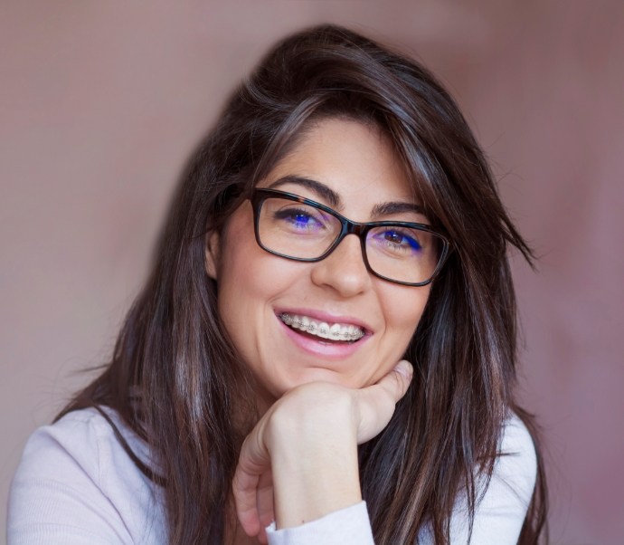 Woman with braces smiling