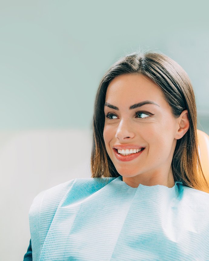 Dentist and patient engaged in conversation